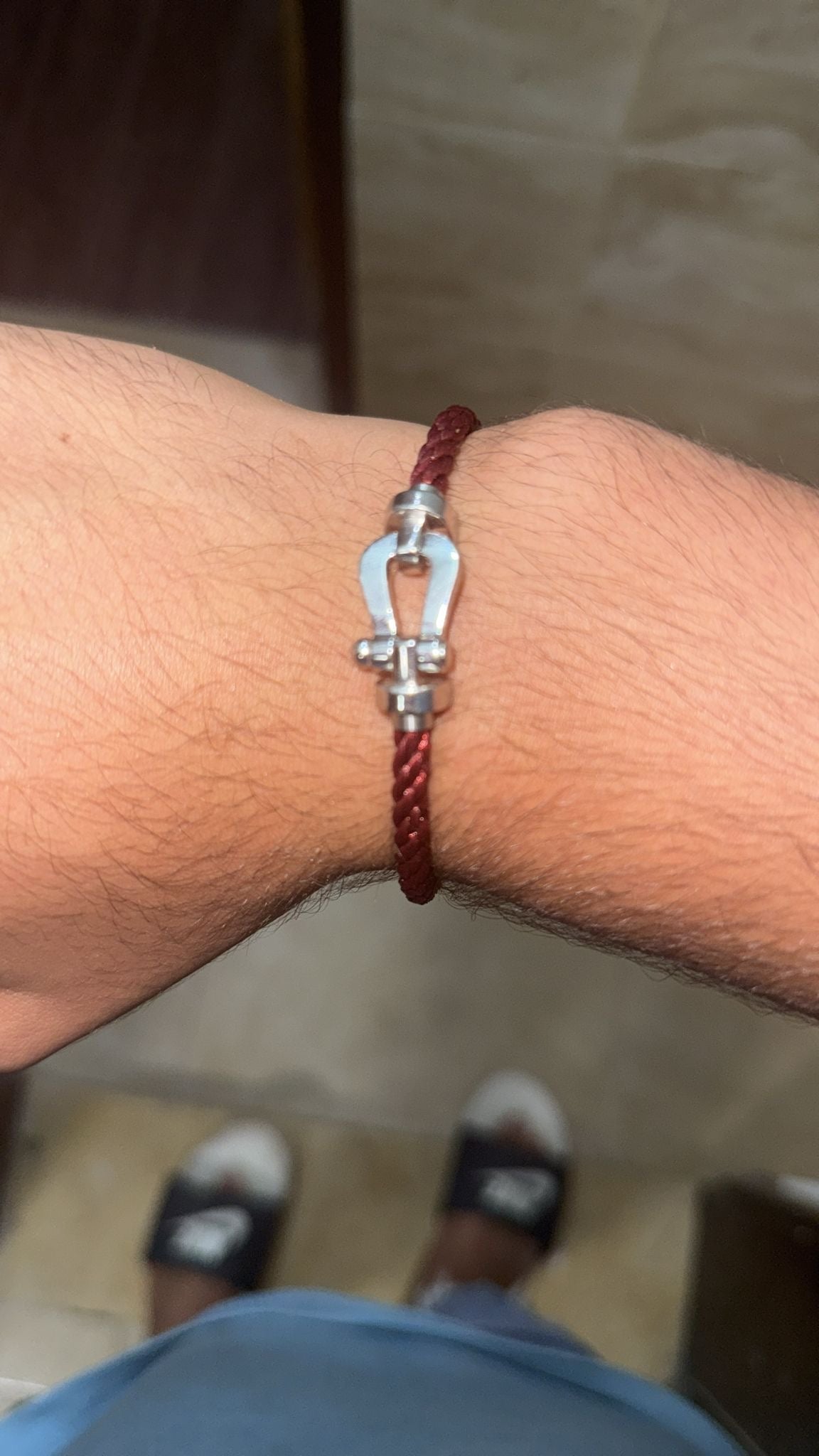 Luxurious bracelet with a burgundy rope strap and a shiny silver buckle — JEWELLUXE™