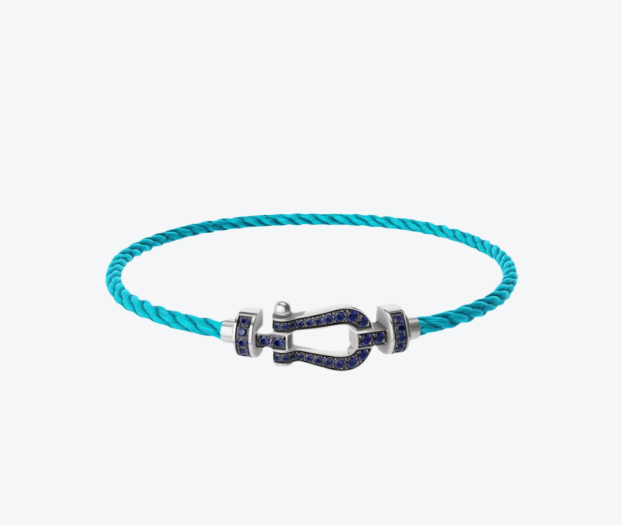 צמיד יוקרתי עם רצועת חבל (דק) בצבע תכלת ואבזם כסוף משובץ זירקונים כחולים נוצצים