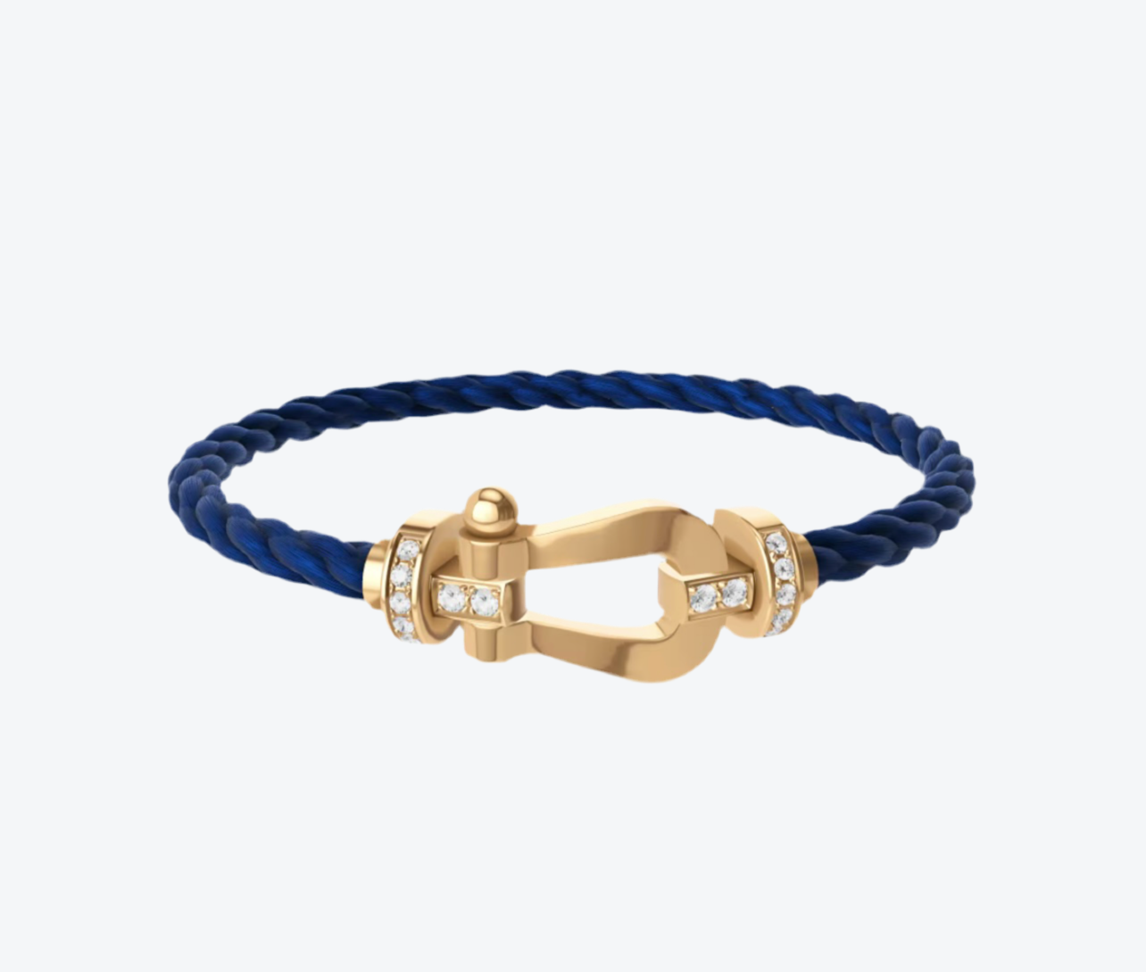 צמיד יוקרתי עם רצועת חבל כחולה ואבזם בגוון זהב משובץ חצי זירקונים