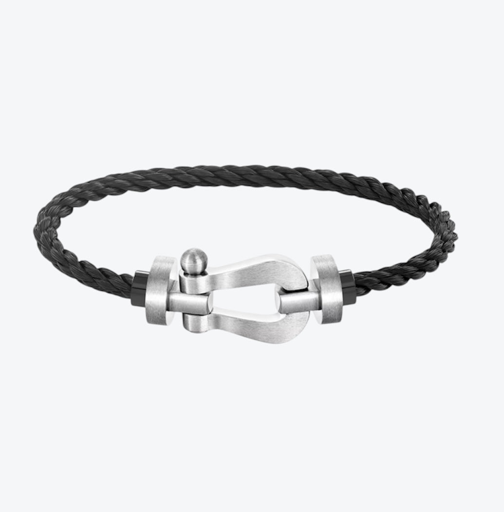 Luxury bracelet with a black rope strap and a brushed silver-tone clasp — JEWELLUXE™