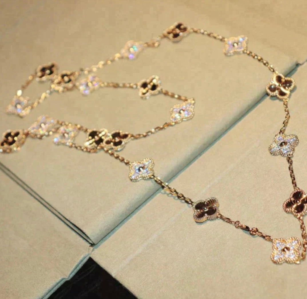 20-leaf clover necklace in gold with a gold-tone clover pendant and sparkling zircons
