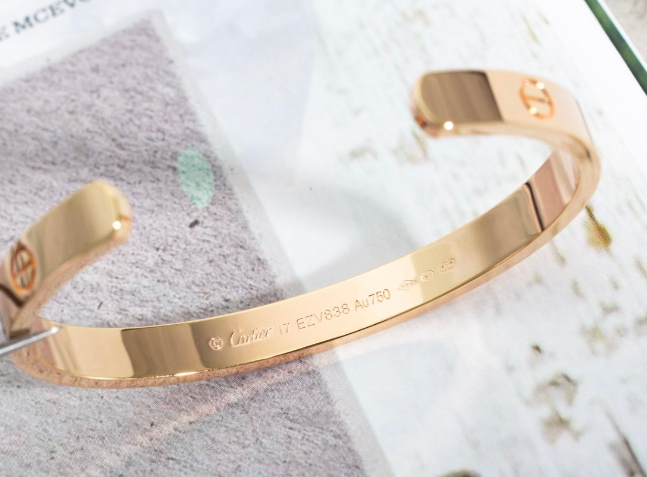 צמיד אלגנטי פתוח בגוון זהב ורוד מבריק