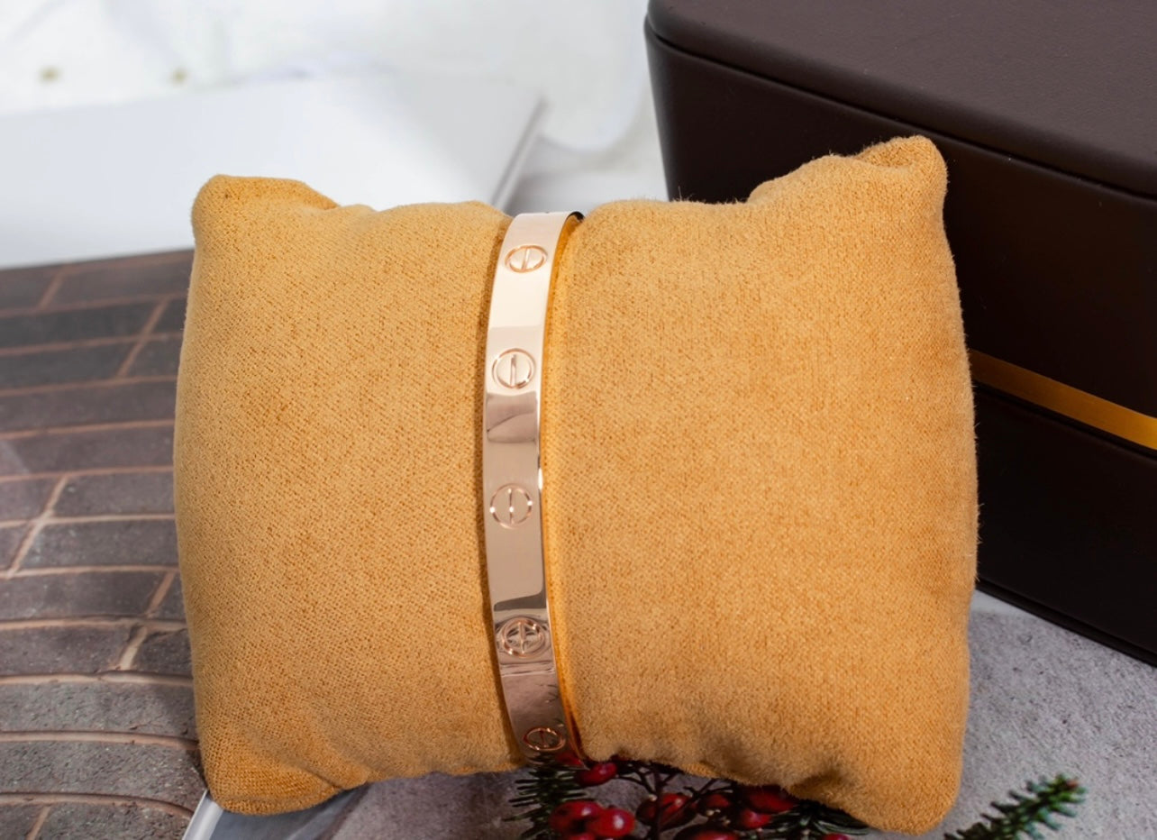 צמיד אלגנטי פתוח בגוון זהב ורוד מבריק