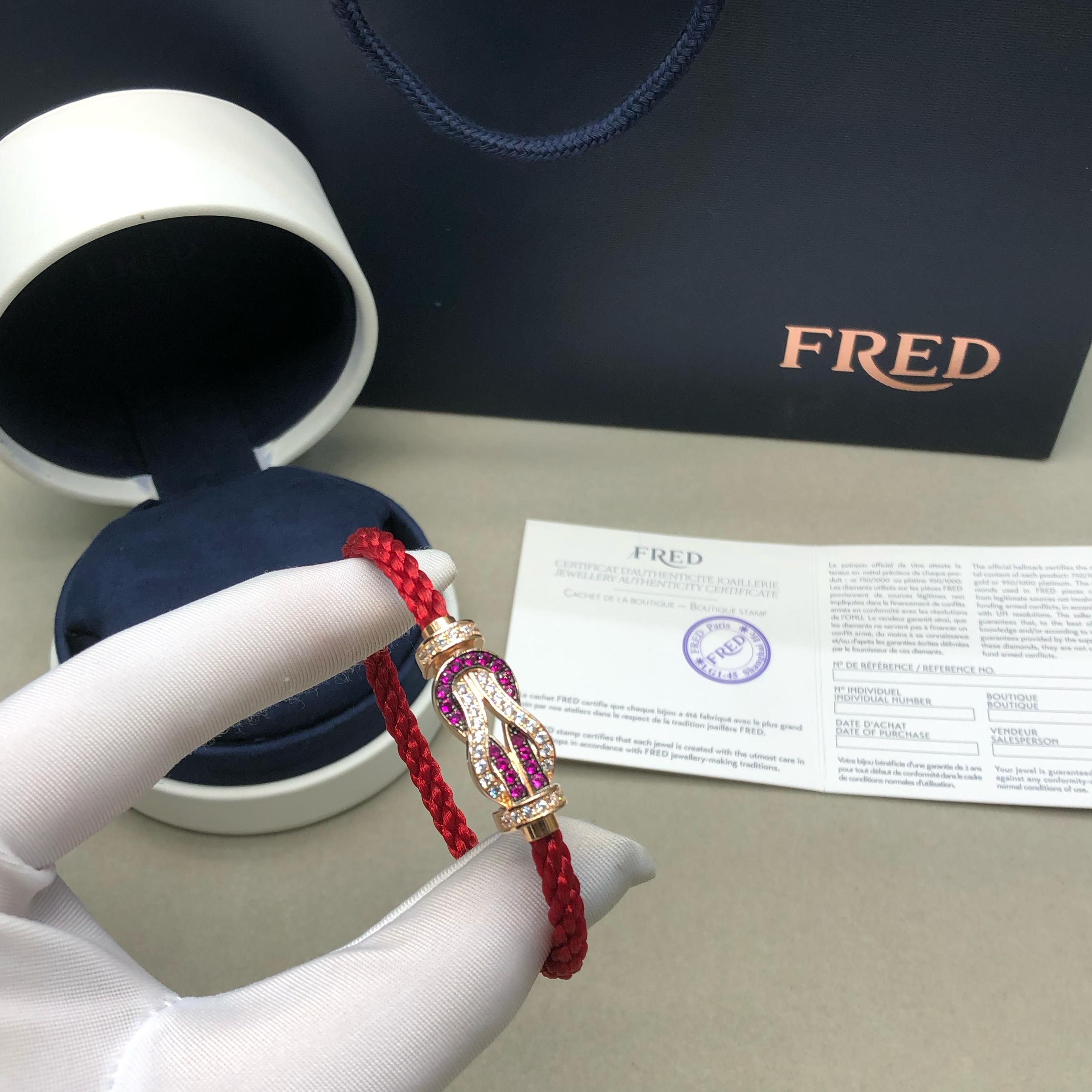 צמיד יוקרתי עם רצועת חבל אדומה עם אבזם אינסוף בגוון ורוד משובץ זירקונים נוצצים