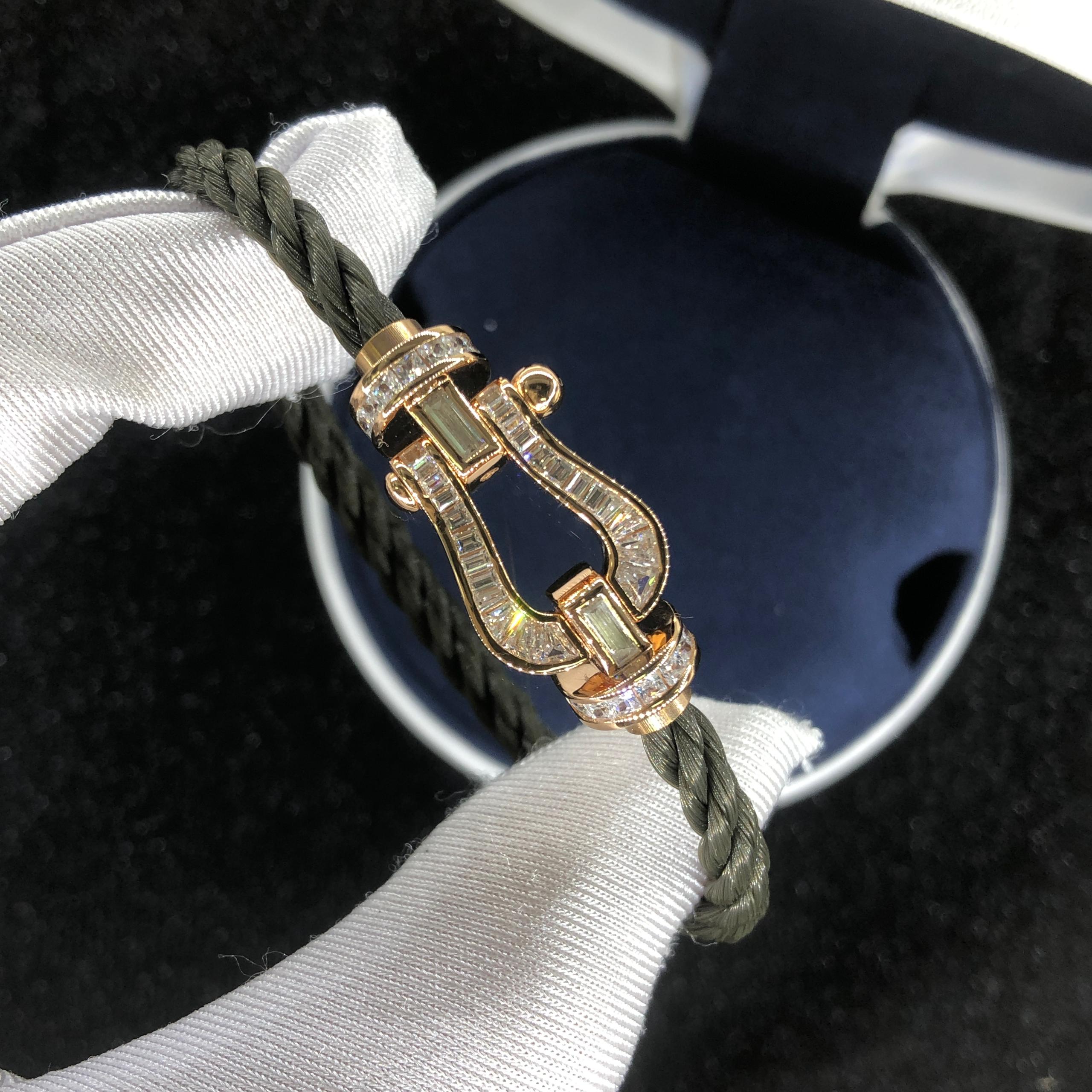 Luxurious bracelet with a khaki rope strap and a rose gold buckle set with dazzling crystals — JEWELLUXE™