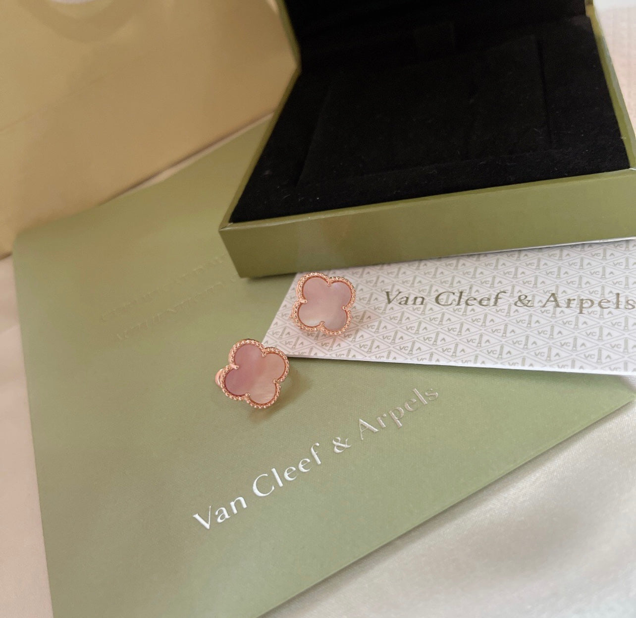 18 carat yellow gold plated clover earrings with a pink clover - timeless luxury and elegance