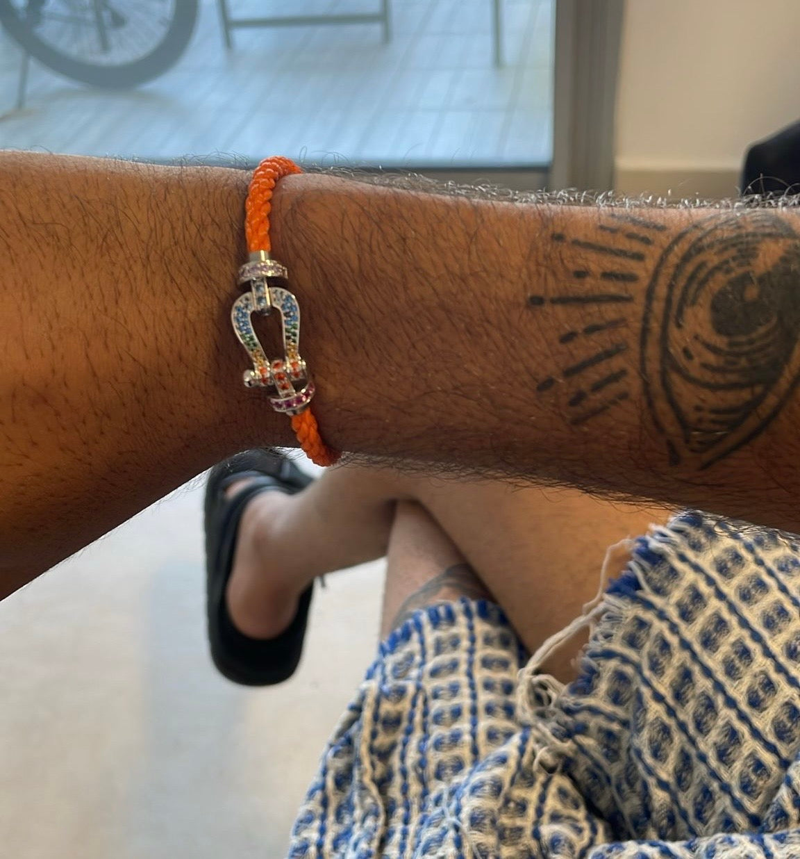 Luxury bracelet with an orange rope strap and a silver-toned buckle set with colorful zircons — JEWELLUXE™