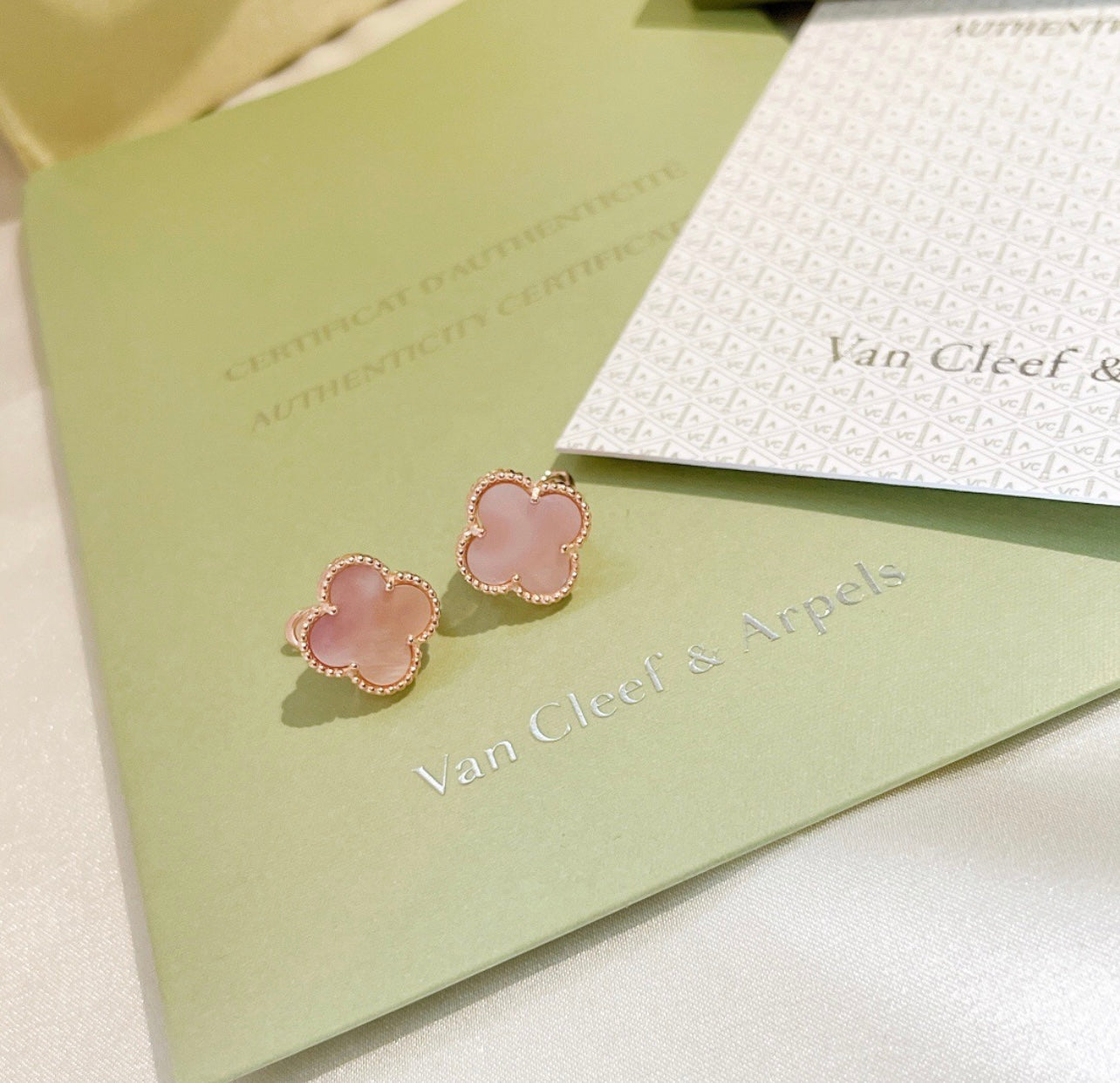 18 carat yellow gold plated clover earrings with a pink clover - timeless luxury and elegance