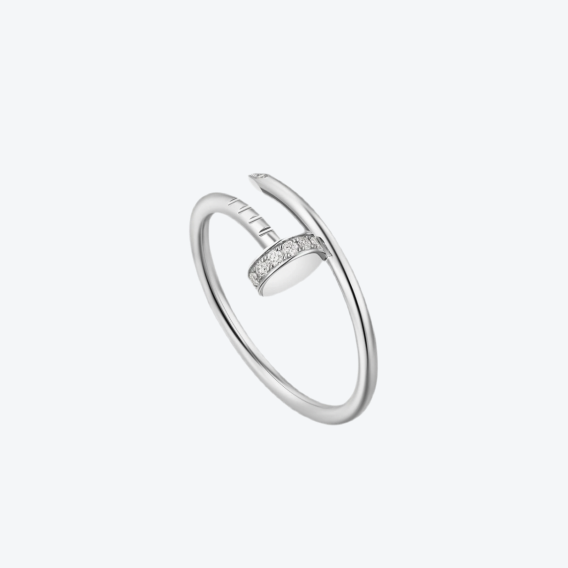 טבעת אלגנטית מסמר בגוון כסף משובצת חצי זירקונים נוצצים