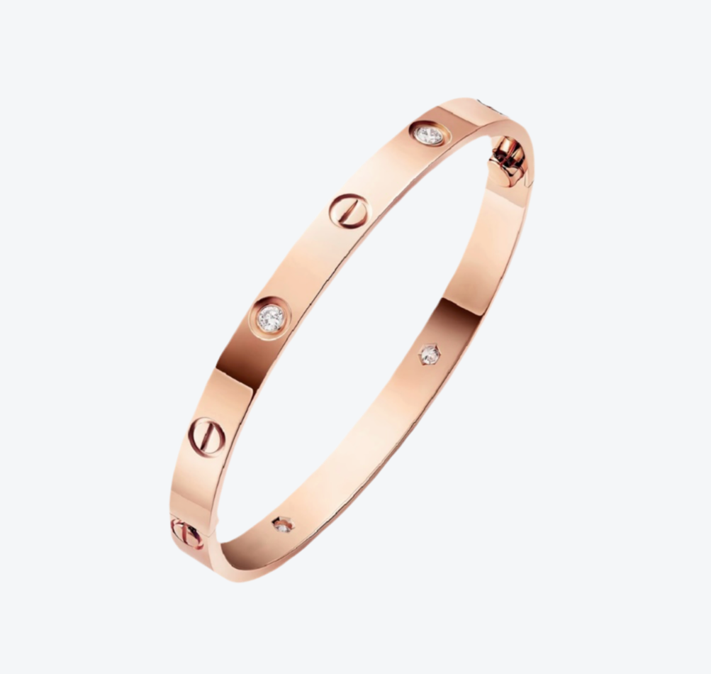 צמיד אלגנטי בגוון זהב ורוד משובץ 4 זירקונים נוצצים