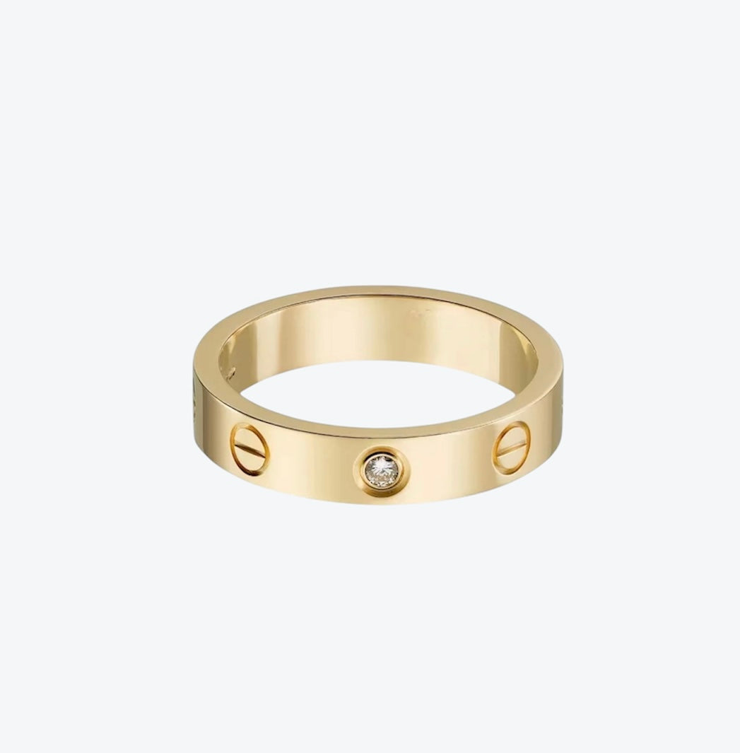 טבעת אלגנטית בגוון גולד משובצת זירקון 1 נוצץ — JEWELLUXE™