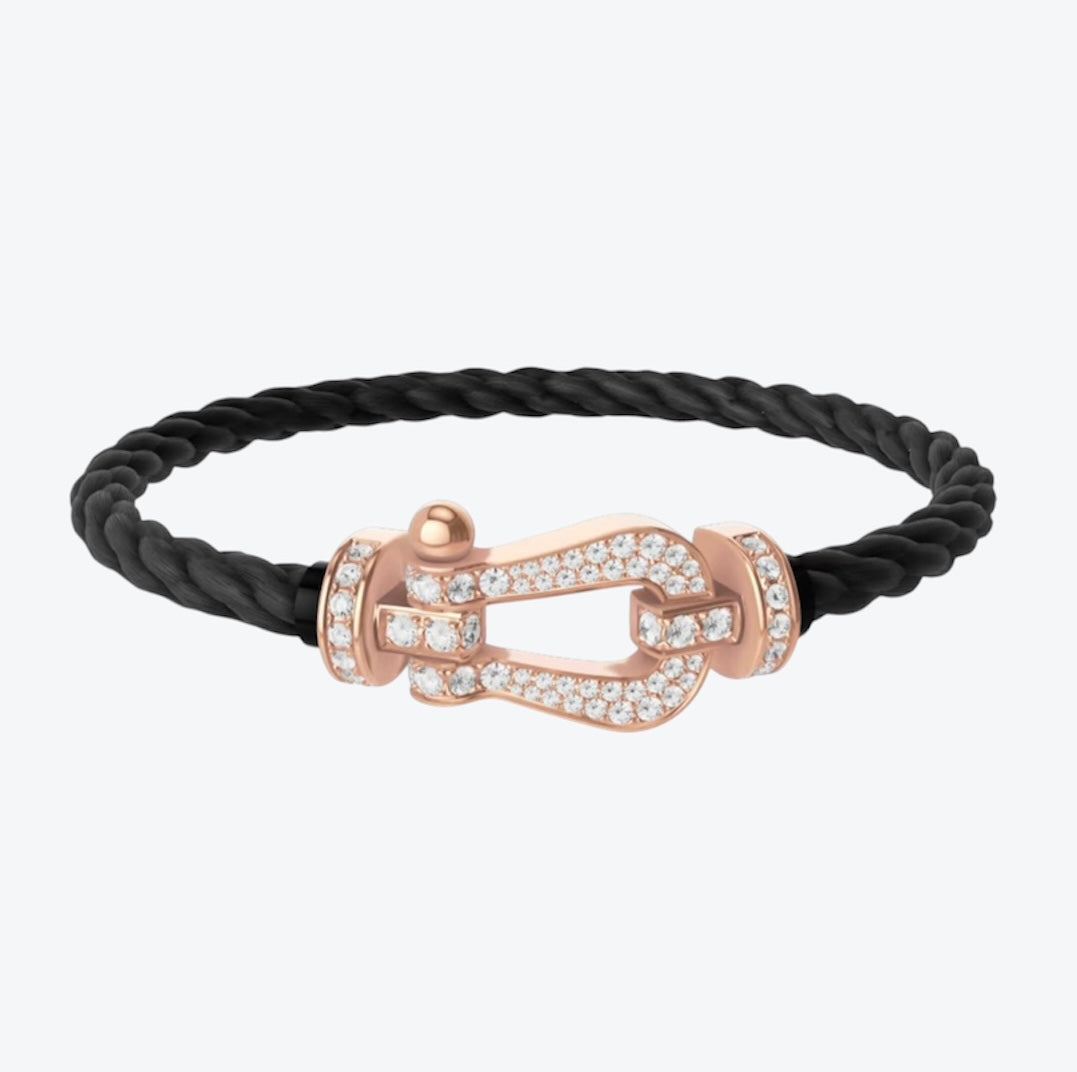 צמיד חבל יוקרתי עם אבזם בגוון זהב ורוד משובץ זירקונים