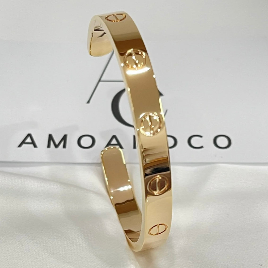 צמיד אלגנטי פתוח בגוון זהב ורוד מבריק