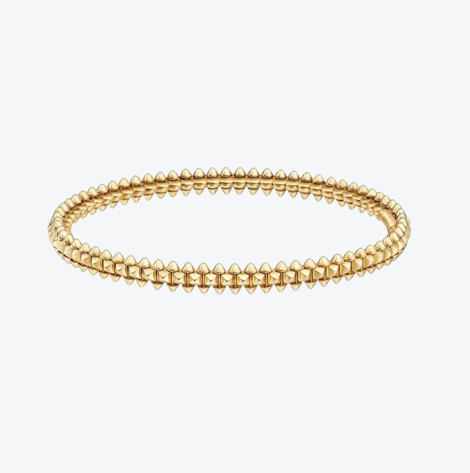 צמיד אלגנטי בגוון גולד מבריק בעיצוב יוקרתי — JEWELLUXE™