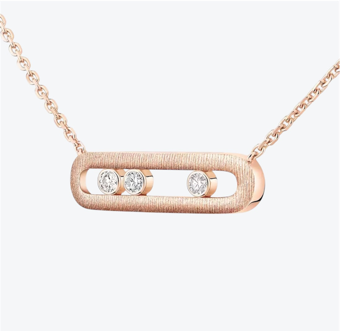 שרשרת אהבה בגוון זהב ורוד עם אבזם 3 זירקונים נעים במרכז